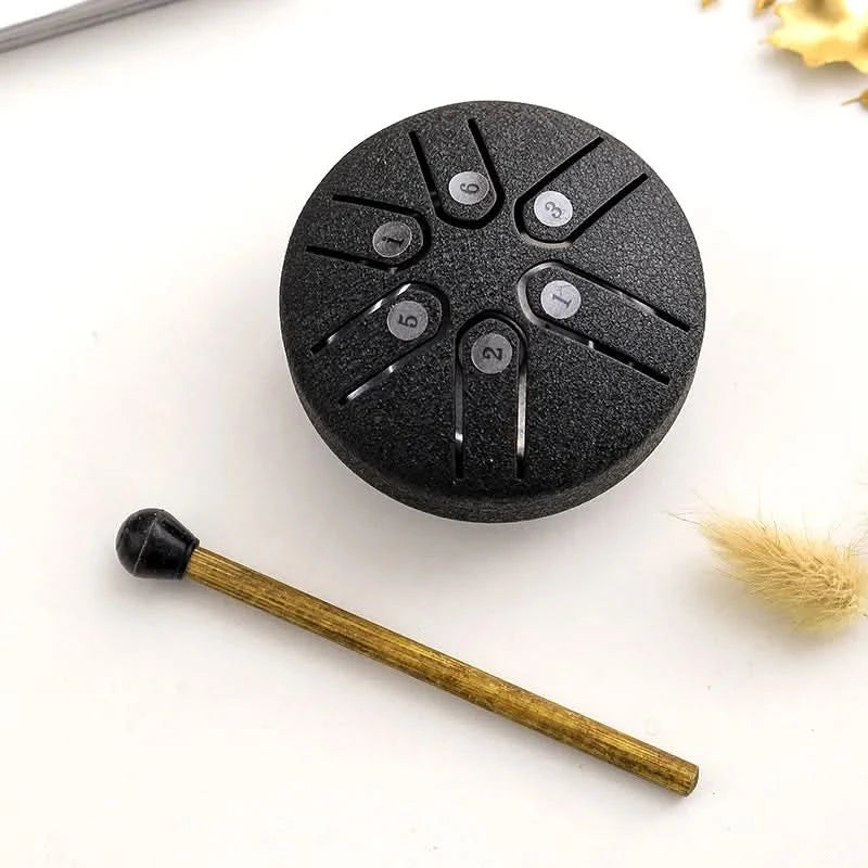 Mini tambur relaxant cu sunete liniștitoare integrate 